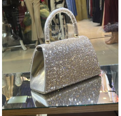 Sac avec strass dorés pour fête