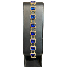 Mehazma  fabriqué avec de l’ambre naturel et plaqué or.