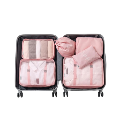 Rangement à valises rose 