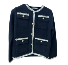 Gilet noir à boutons blancs